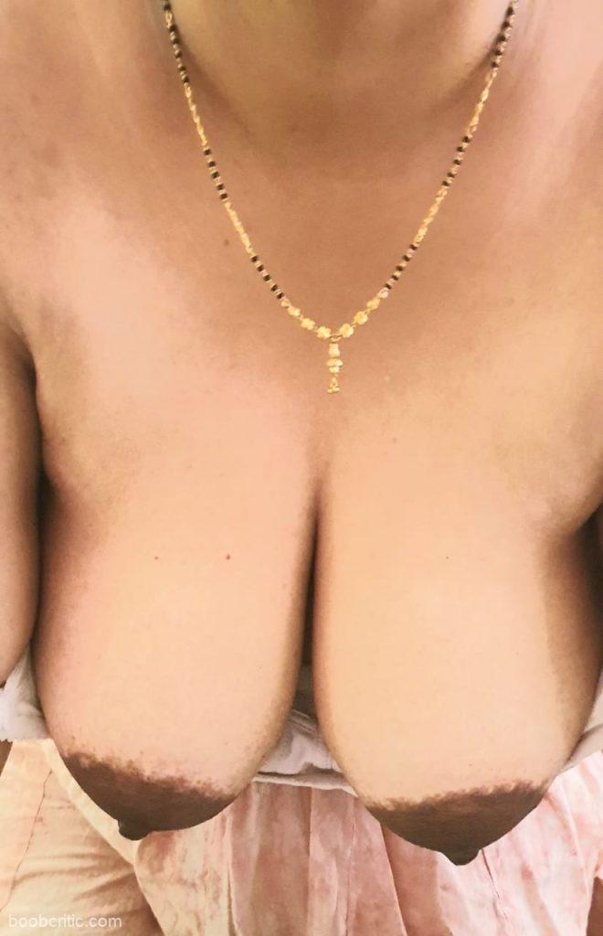 Busty wife hanging melons with chocolate nips